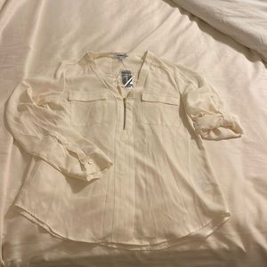 Beautiful cream color blouse with half zip and roll up sleeve